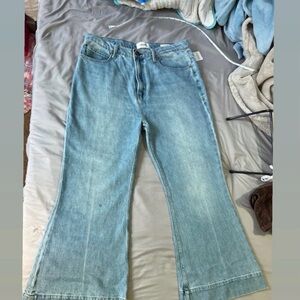 New with tags Free People flared jeans.